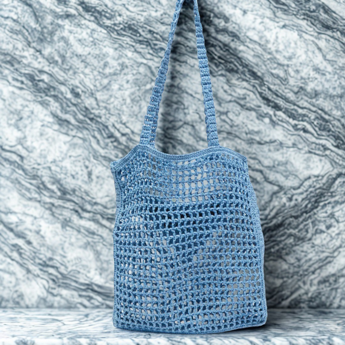 Prada – Shopper-tas in raffia met geweven logo in blauw