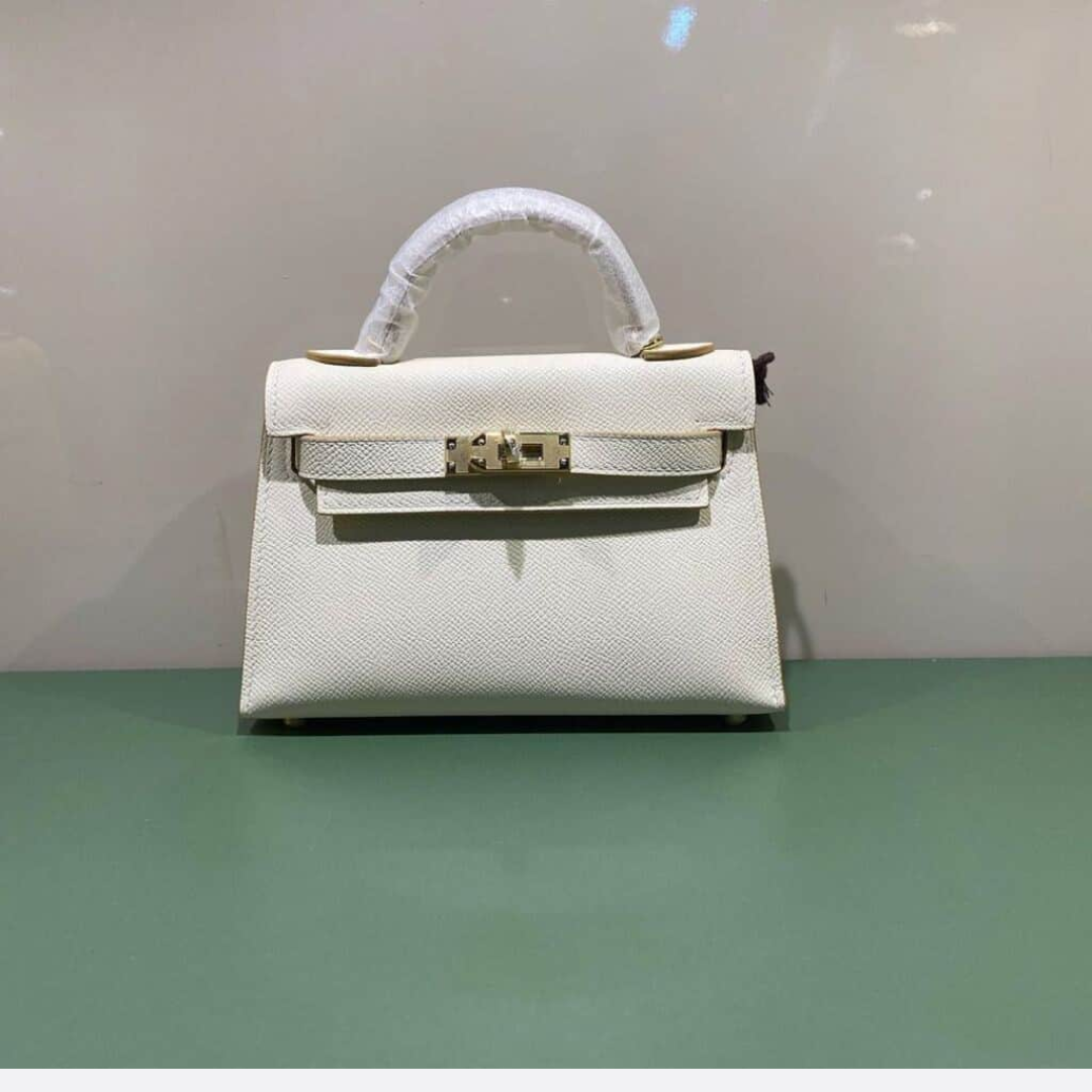 Hermès – Kelly 20-tas in off-white met goudkleurige hardware