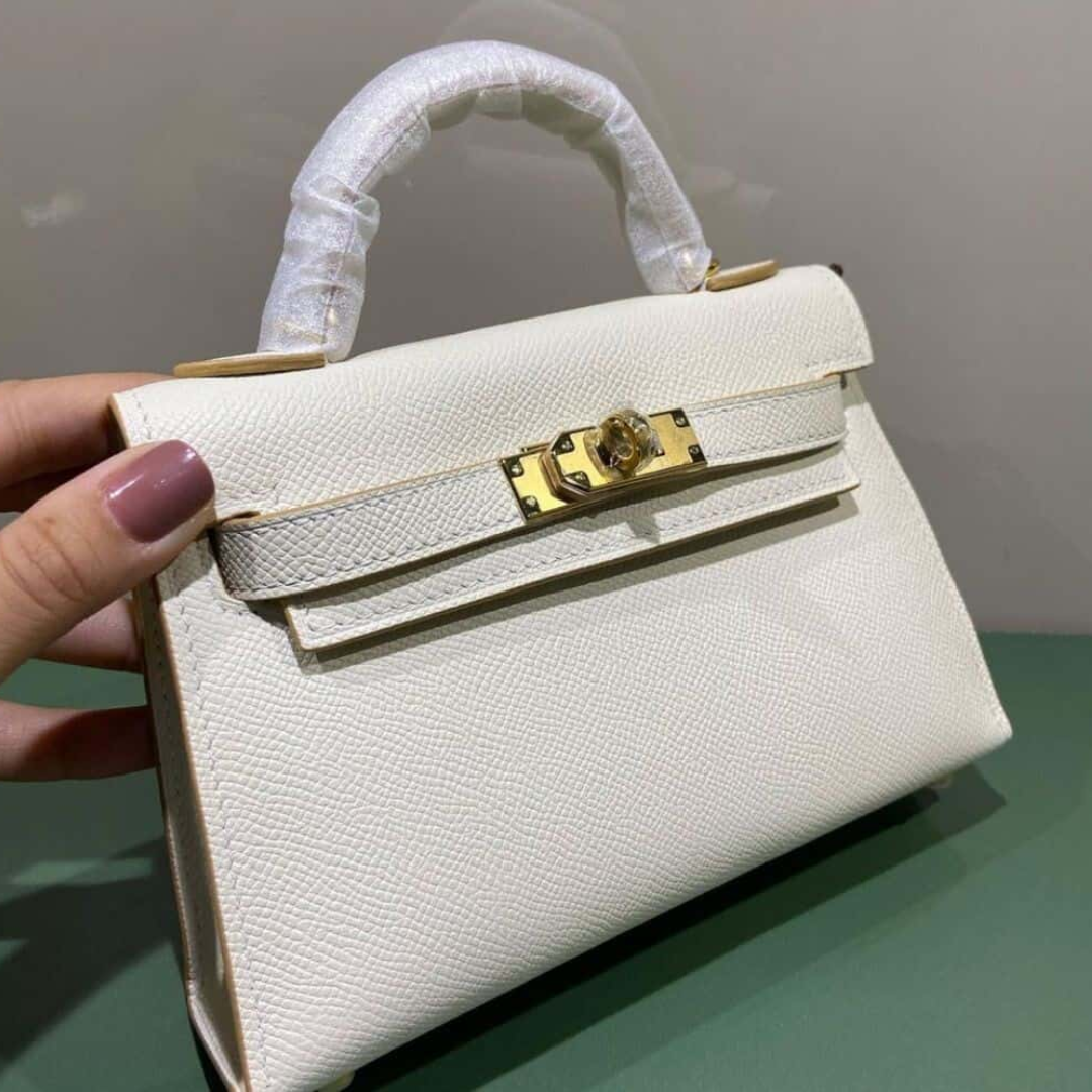 Hermès – Kelly 20-tas in off-white met goudkleurige hardware