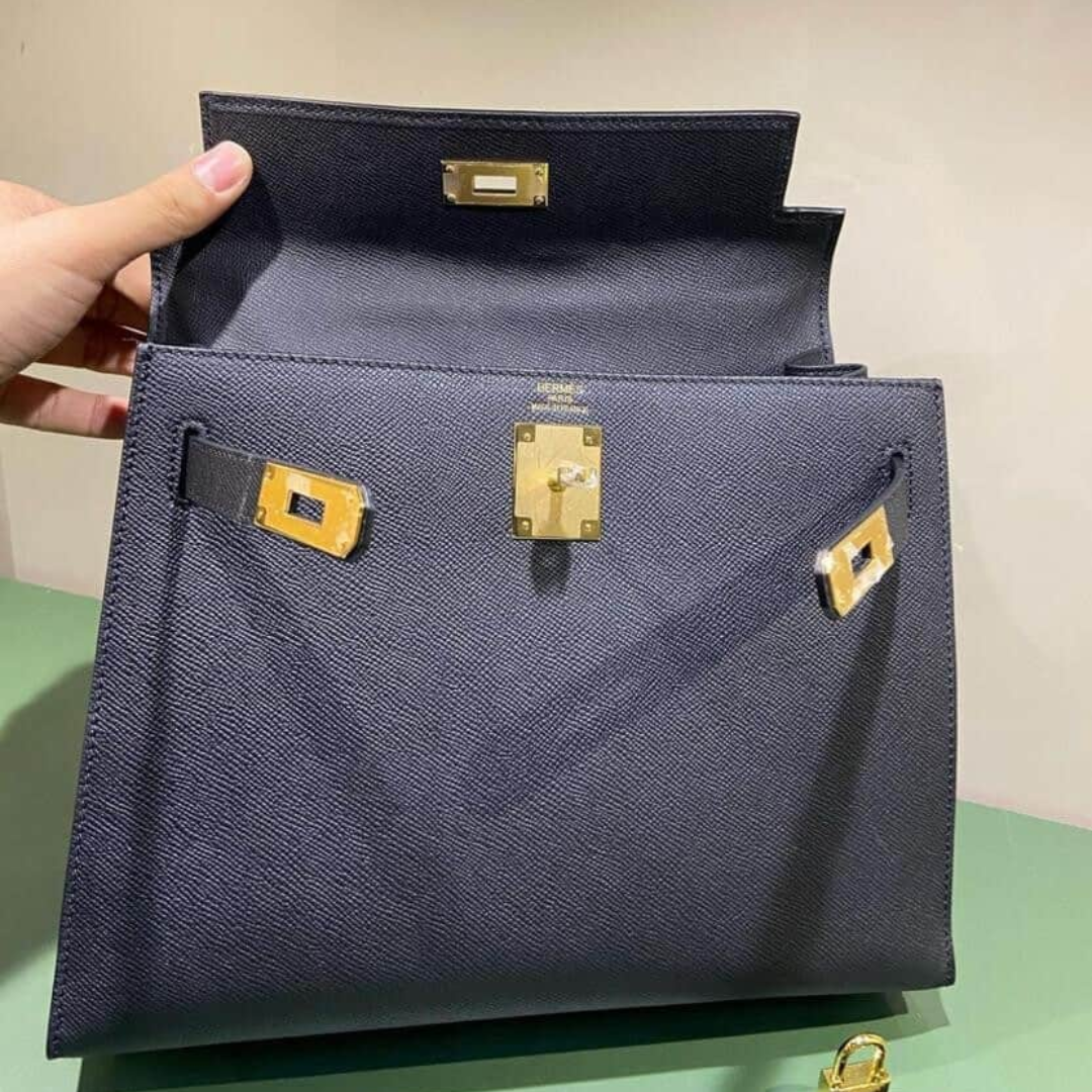 Hermès – Kelly 25-tas in zwart met goudkleurige hardware