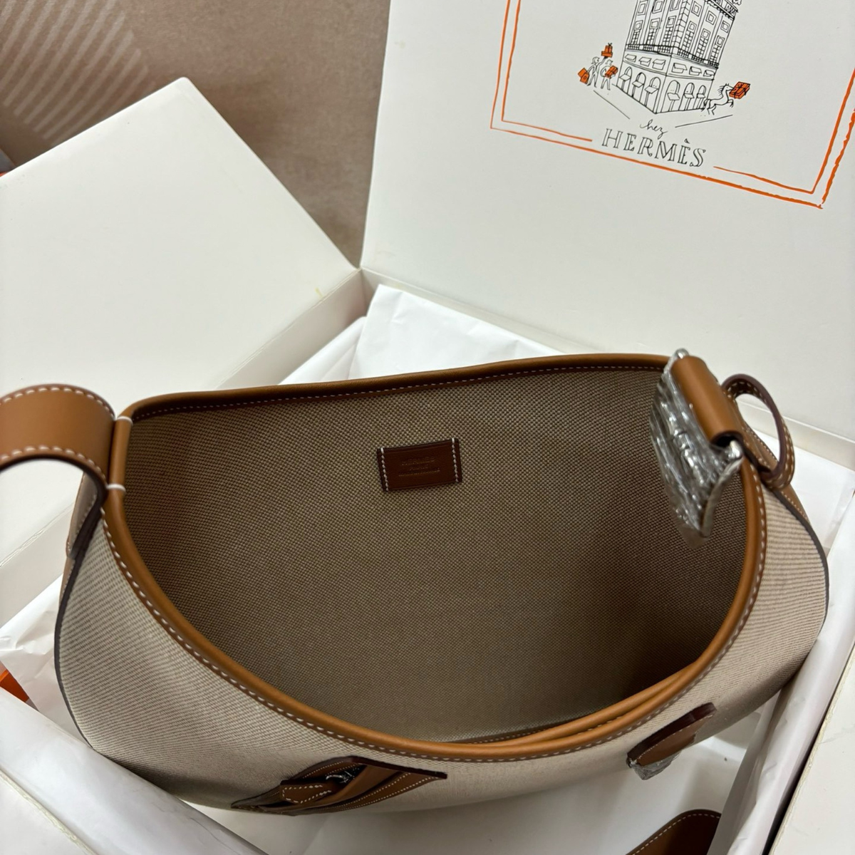 Hermès – P’tit Arçon-tas in canvas en leer