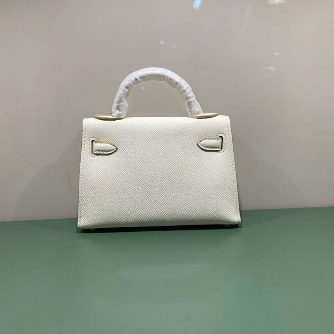 Hermès – Kelly 20-tas in off-white met goudkleurige hardware