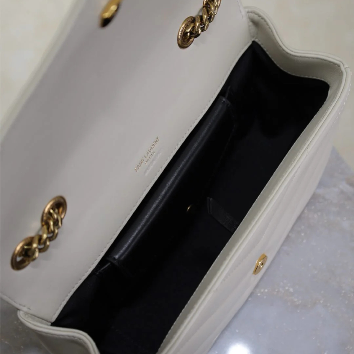 Saint Laurent – Loulou Small Matelassé-tas in wit lamsleer