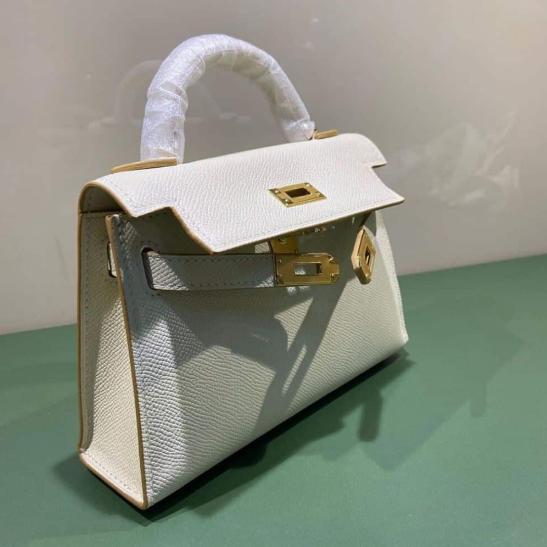 Hermès – Kelly 20-tas in off-white met goudkleurige hardware