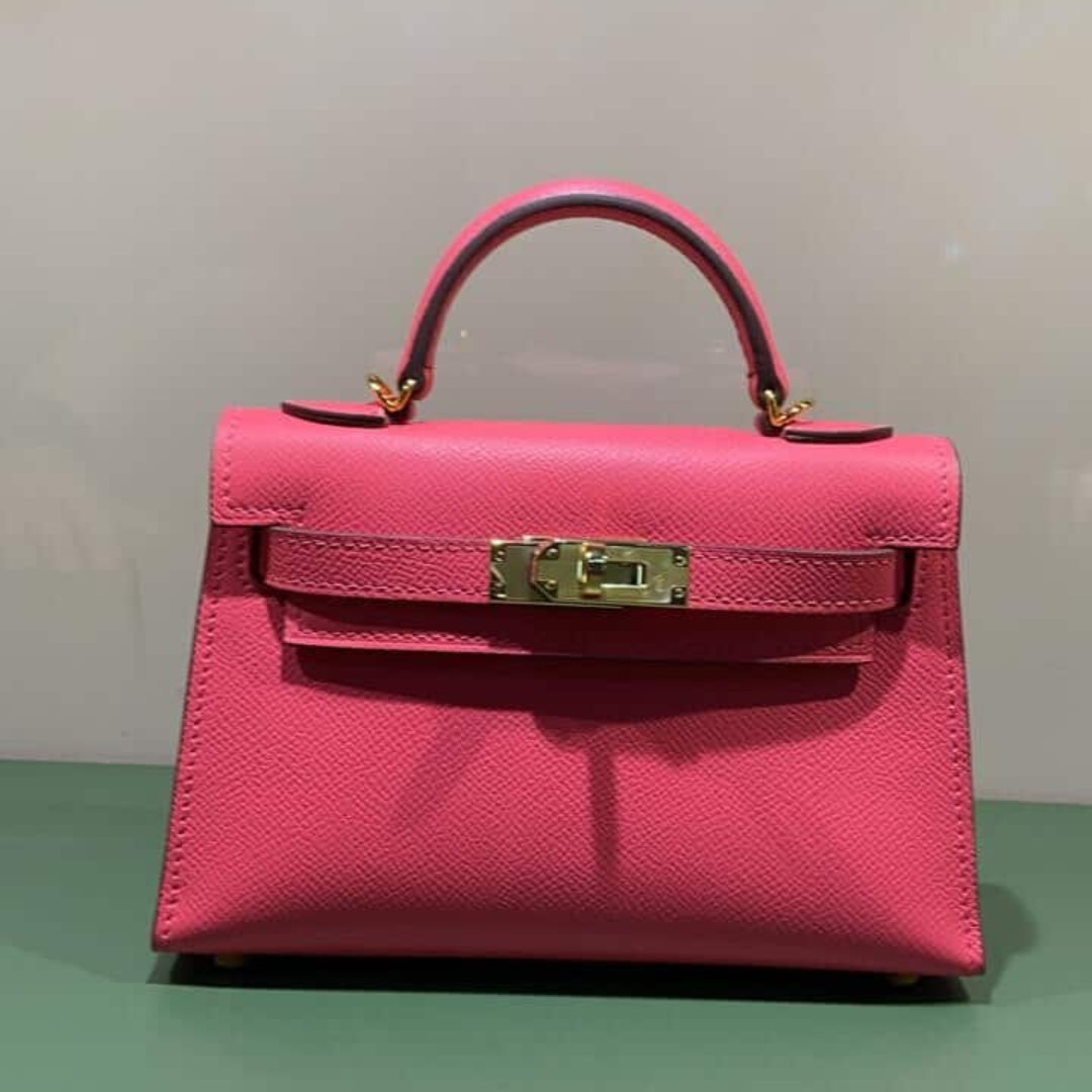 Hermès – Kelly 20-tas in roze met goudkleurige hardware