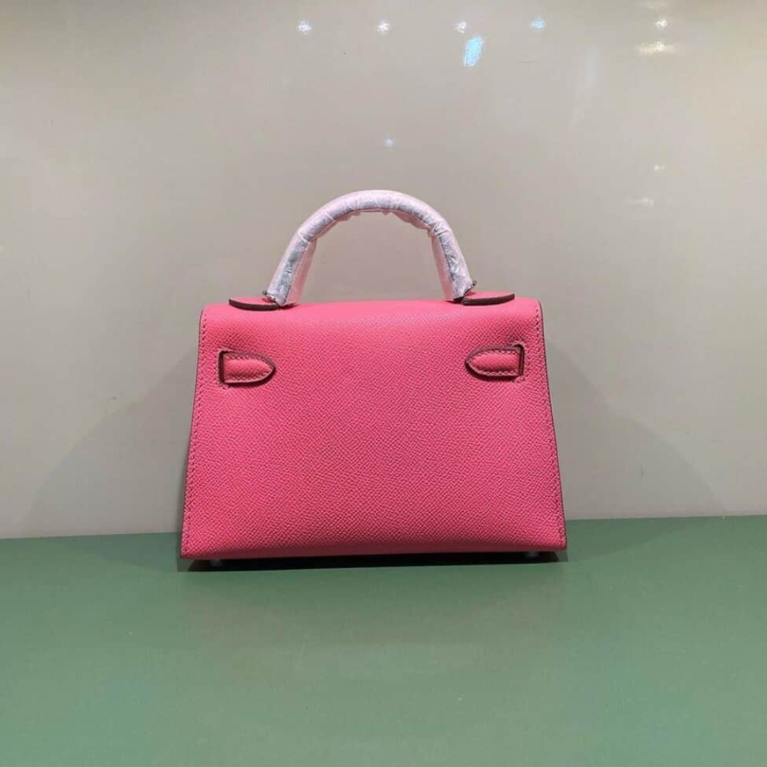 Hermès – Kelly 20-tas in roze met goudkleurige hardware