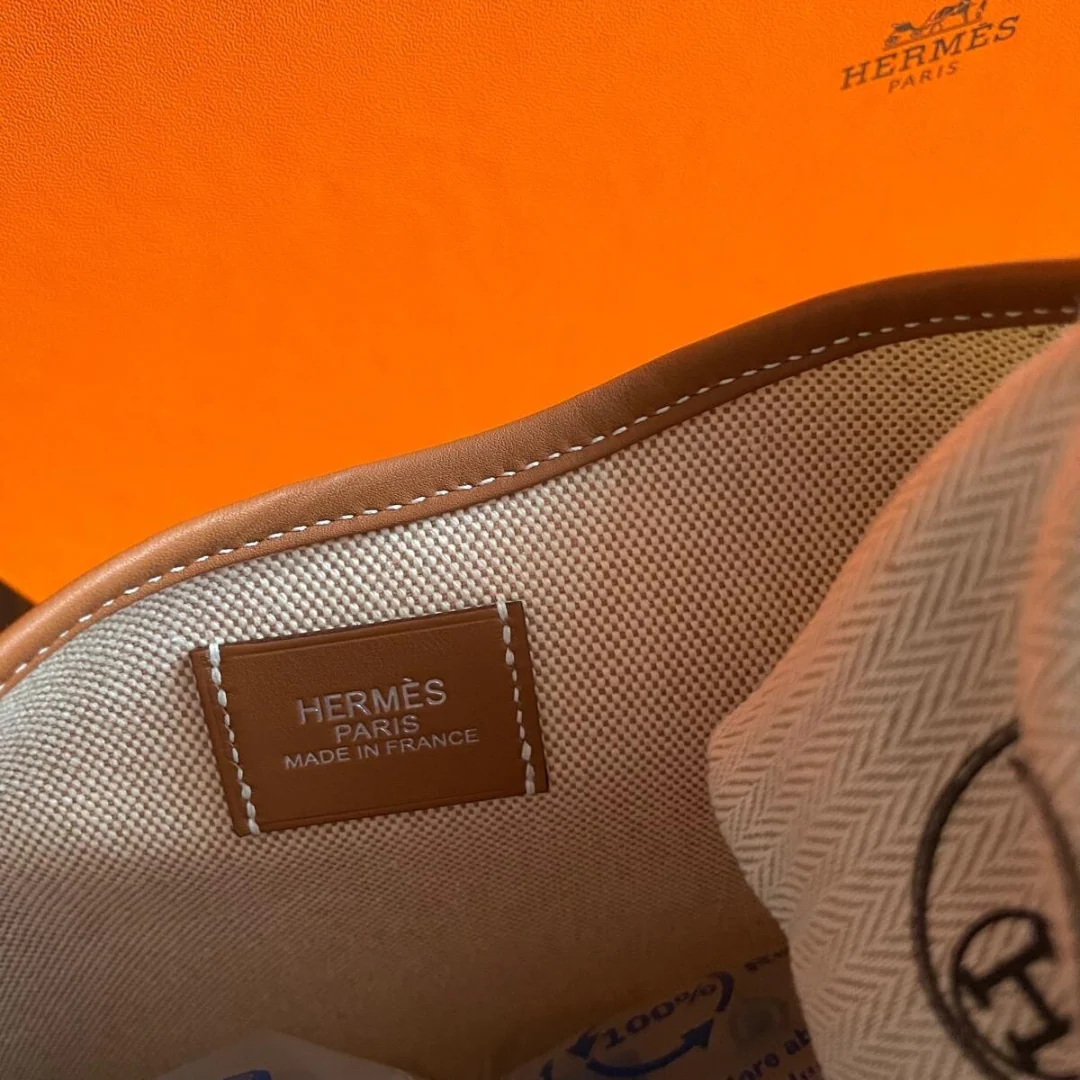 Hermès – P’tit Arçon-tas in canvas en leer